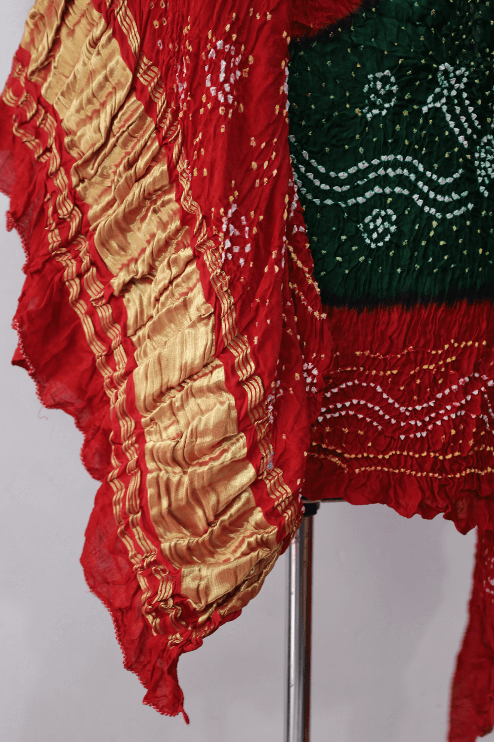 Handcrafted pine green and red Bandhani dupatta made from premium Gajji silk fabric