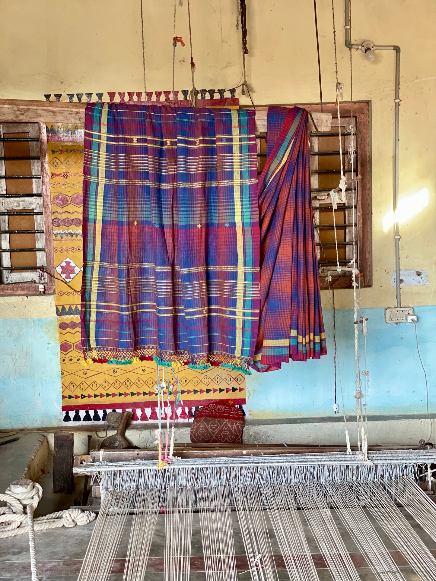 Plum Kala Cotton Bhujodi saree featuring traditional handwoven patterns and artisanal craftsmanship
