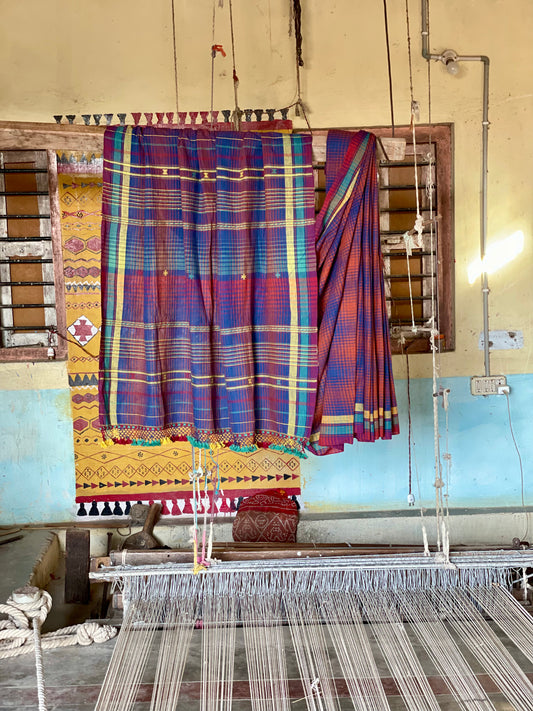 Plum Kala Cotton Bhujodi saree featuring traditional handwoven patterns and artisanal craftsmanship
