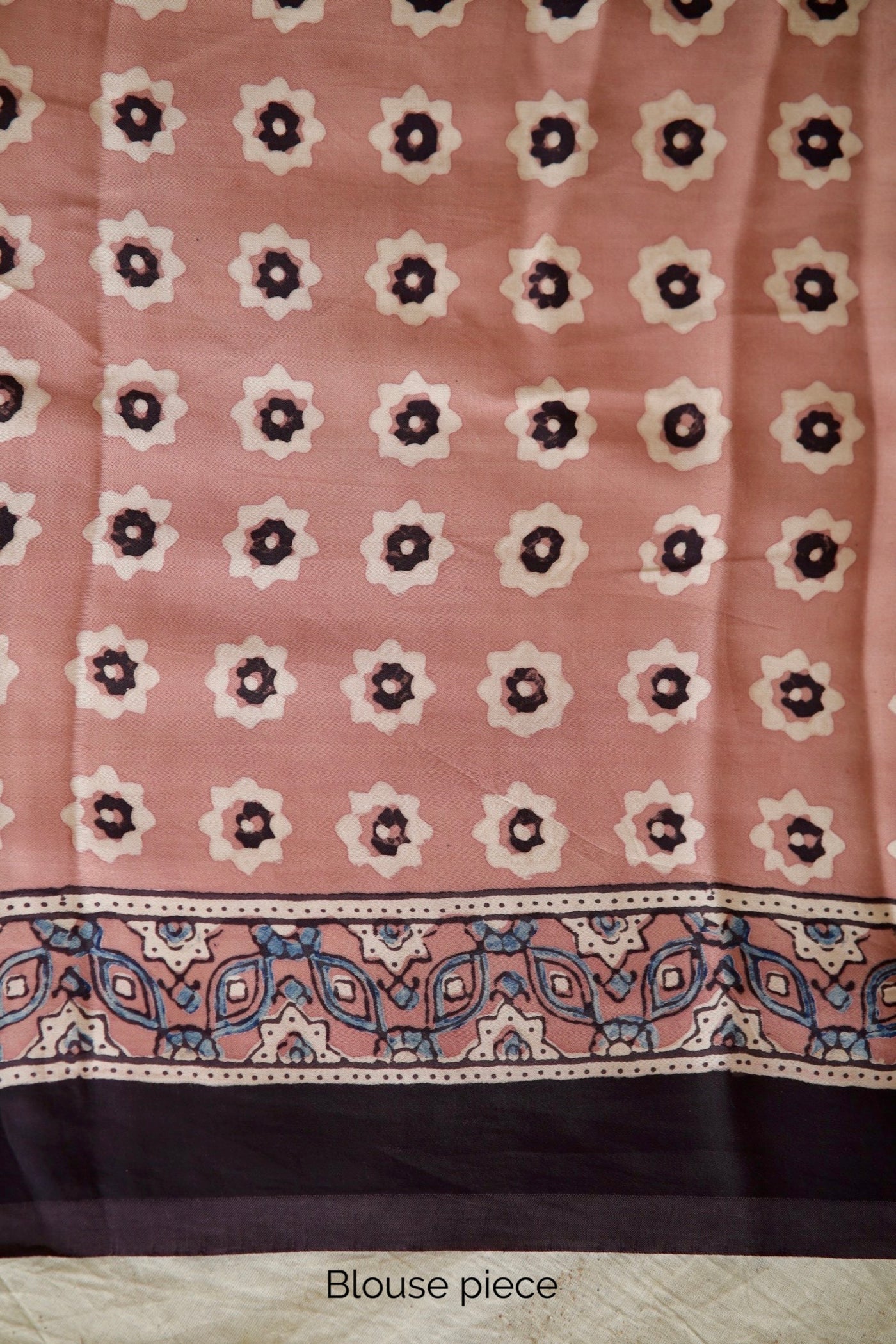 Traditional antique rose Ajrakh printed modal silk saree crafted by artisans with refined craftsmanship