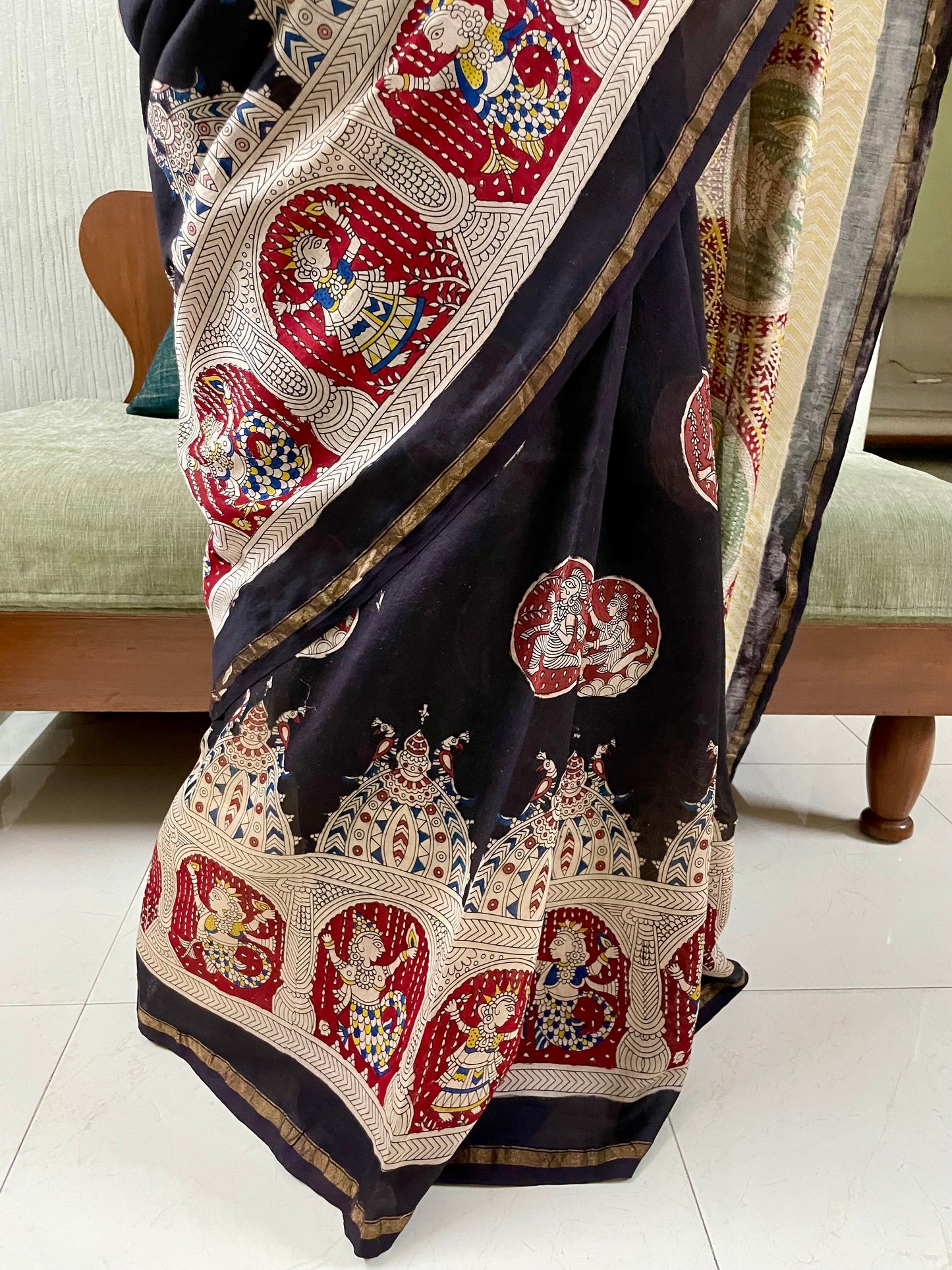 Premium black handpainted saree reflecting the cultural richness and storytelling tradition of Mata Ni Pachedi art
