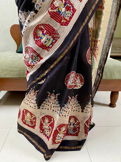 Premium black handpainted saree reflecting the cultural richness and storytelling tradition of Mata Ni Pachedi art
