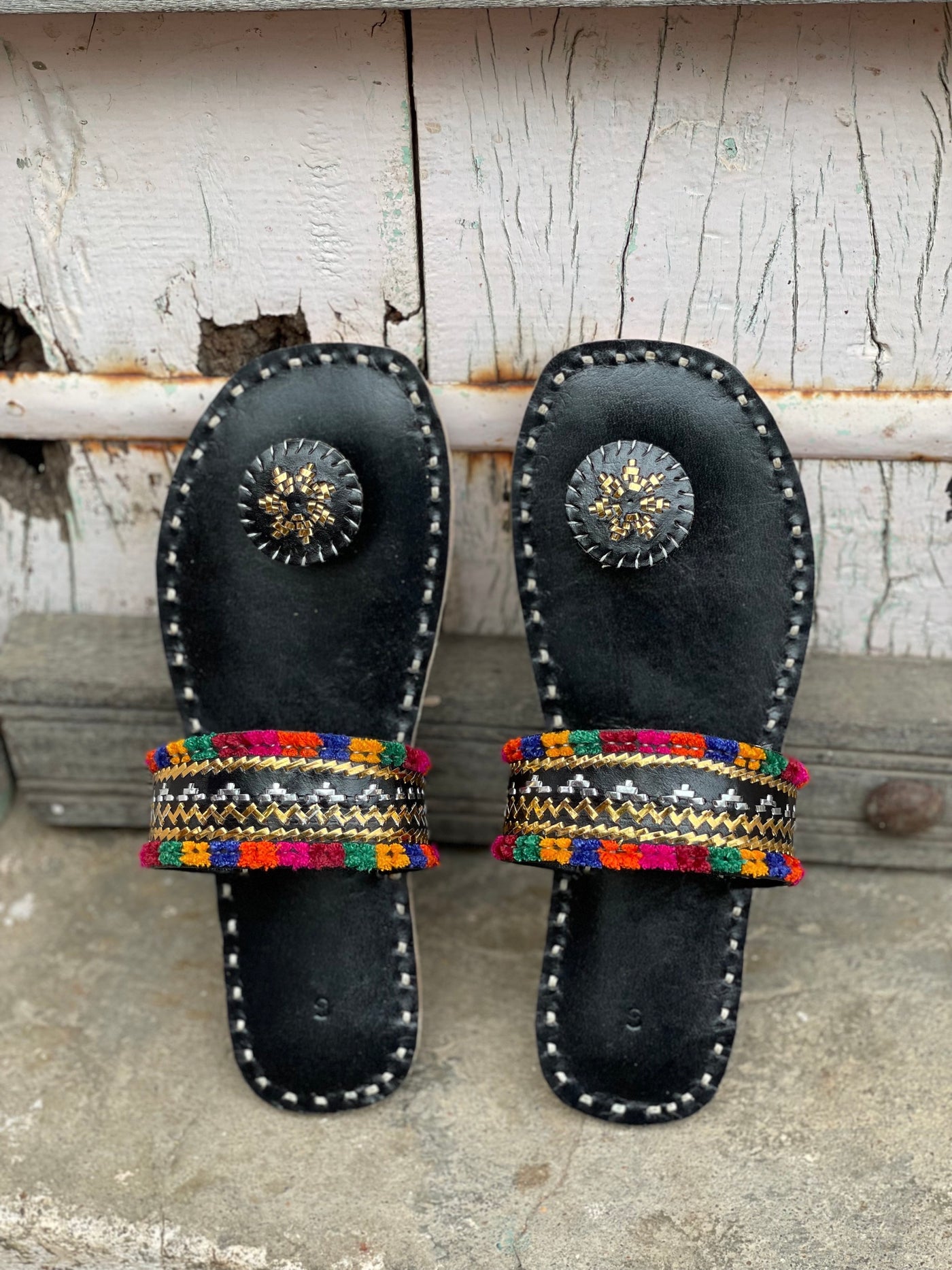 Premium black handcrafted leather flats with fine artisan stitching details