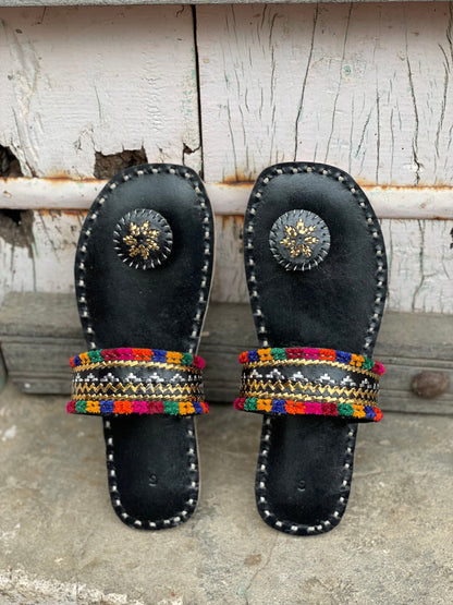 Premium black handcrafted leather flats with fine artisan stitching details