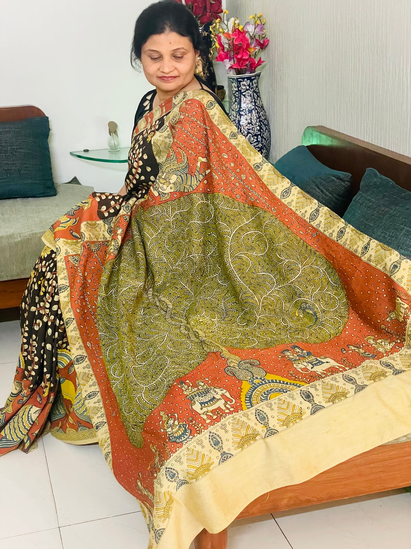 Premium bronze handpainted saree reflecting the cultural richness and storytelling tradition of Mata Ni Pachedi art