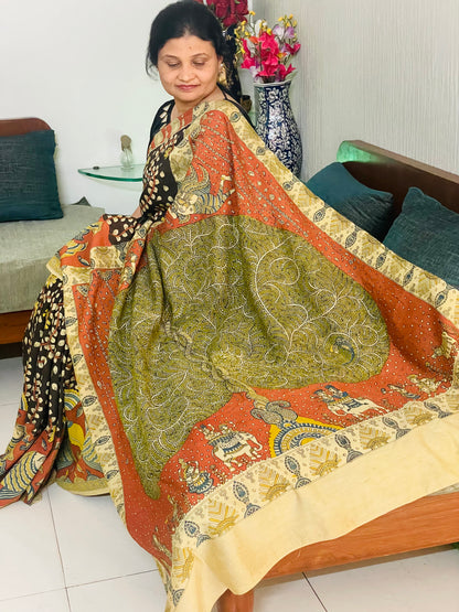 Premium bronze handpainted saree reflecting the cultural richness and storytelling tradition of Mata Ni Pachedi art