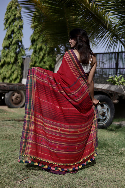 Premium cherry Kala Cotton saree showcasing traditional Bhujodi textile artistry and timeless appeal