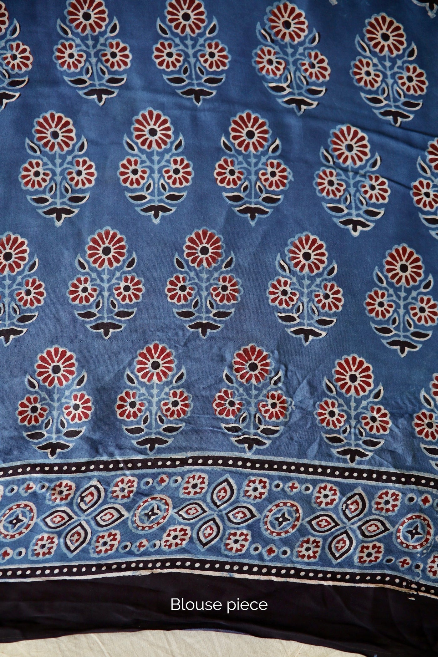 Traditional cobalt blue Ajrakh printed modal silk saree crafted by artisans with exceptional craftsmanship