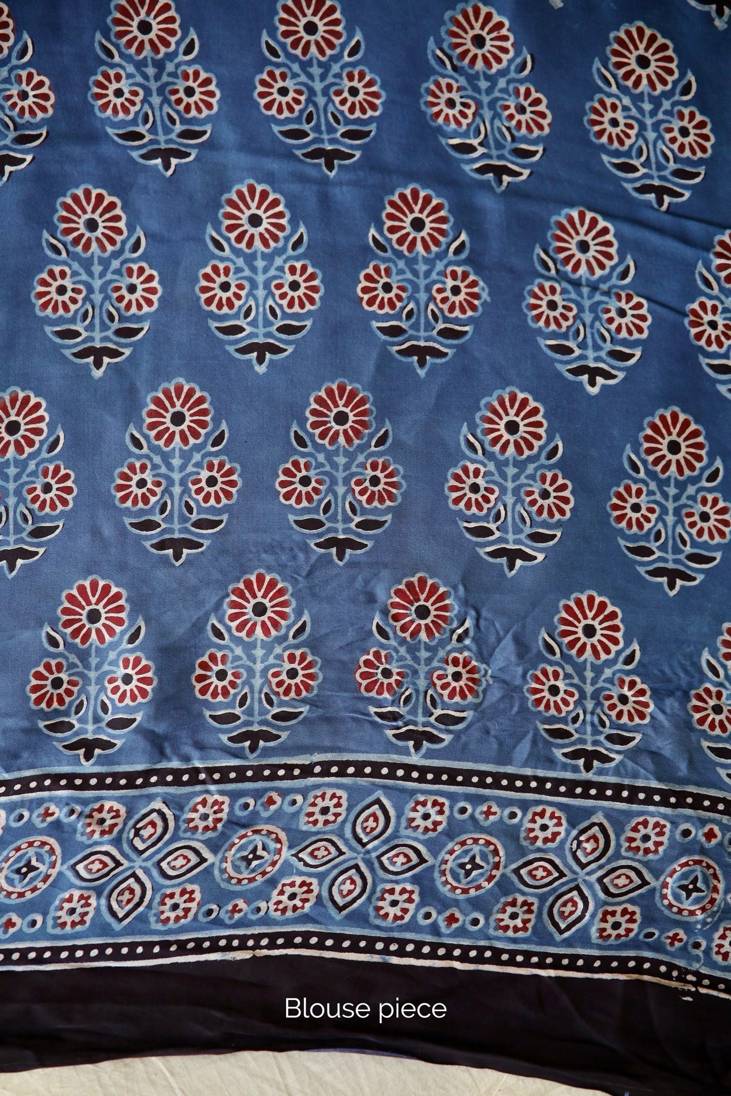 Traditional cobalt blue Ajrakh printed modal silk saree crafted by artisans with exceptional craftsmanship