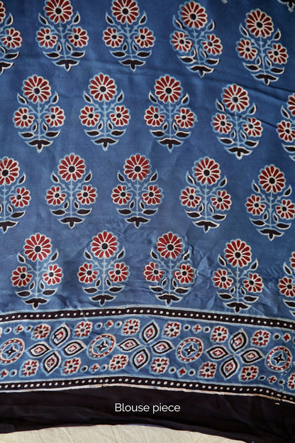 Traditional cobalt blue Ajrakh printed modal silk saree crafted by artisans with exceptional craftsmanship