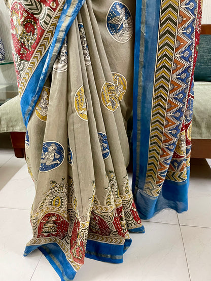 Premium creamy red handpainted saree reflecting the cultural richness and storytelling tradition of Mata Ni Pachedi art