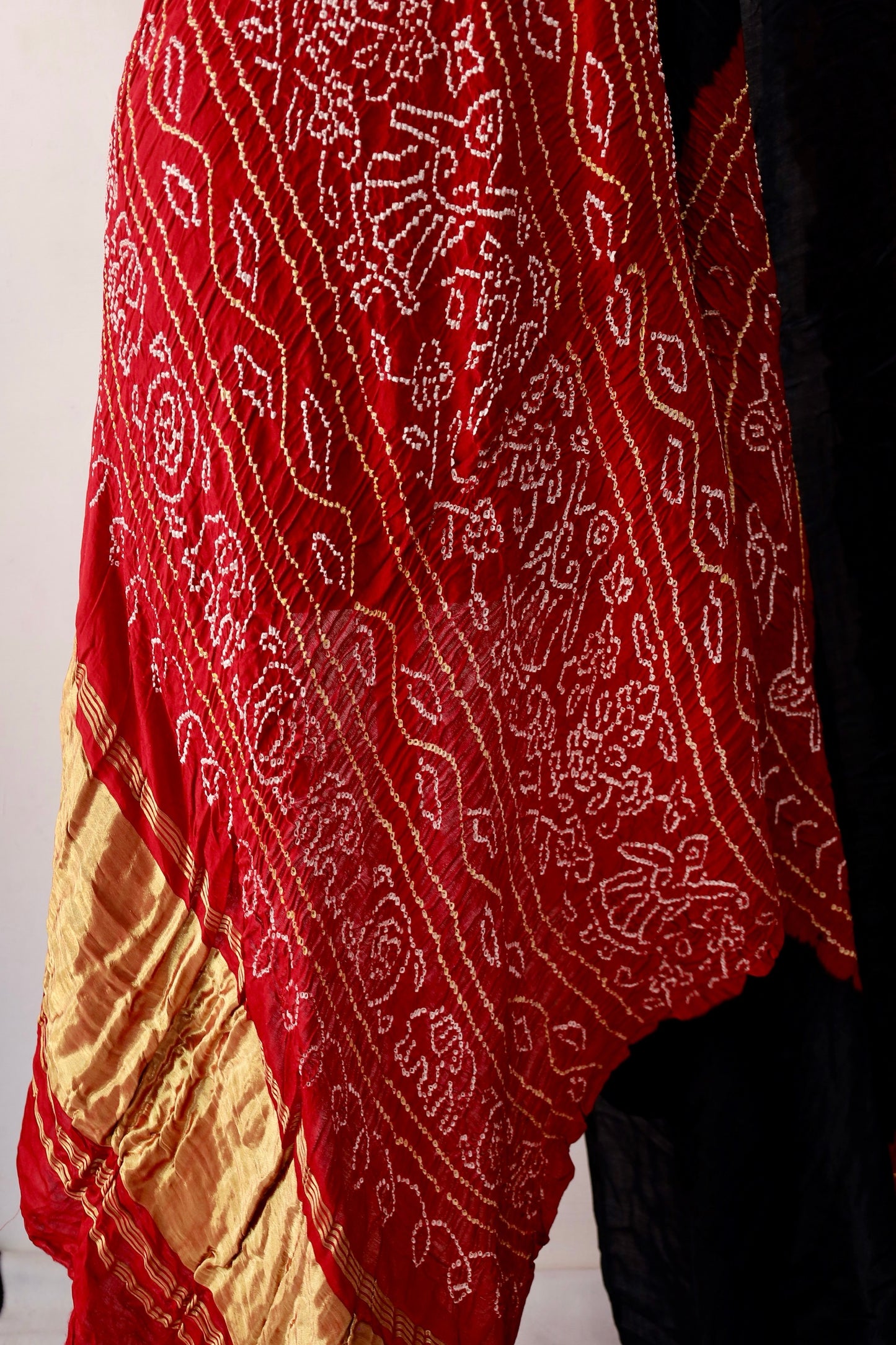 Premium Crimson Edge Bandhani Gajji silk saree highlighting fine artisan craftsmanship and festive elegance