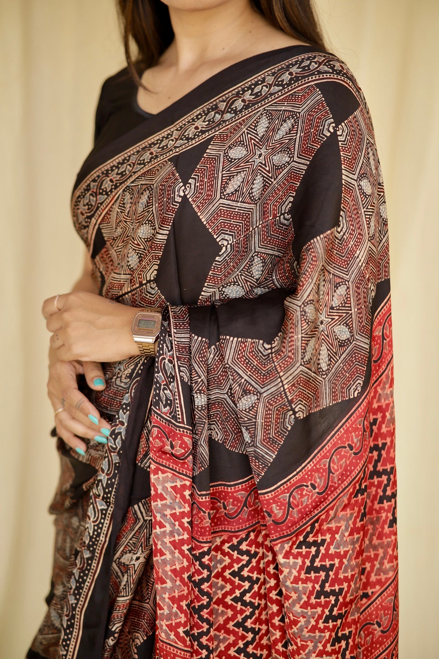 Traditional dark mocha Ajrakh printed modal silk saree crafted by artisans with exceptional craftsmanship