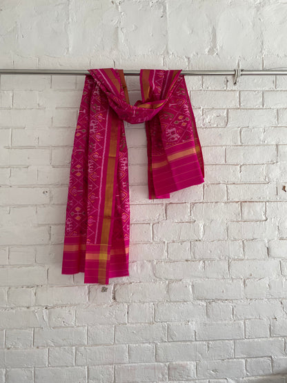 Dark pink Patola Single Ikkat dupatta featuring intricate woven motifs and traditional artisan craftsmanship
