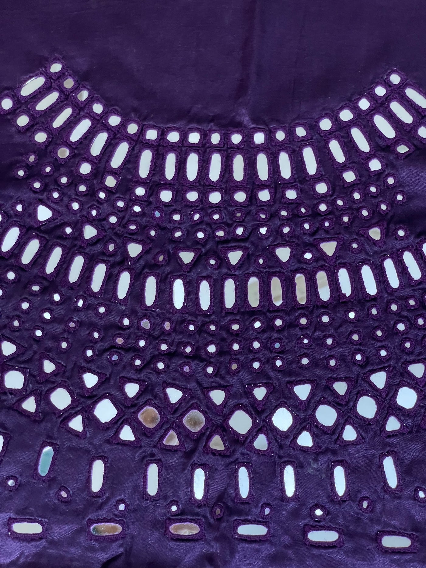 Elegant deep violet blouse piece with intricate artisan mirror work embroidery
