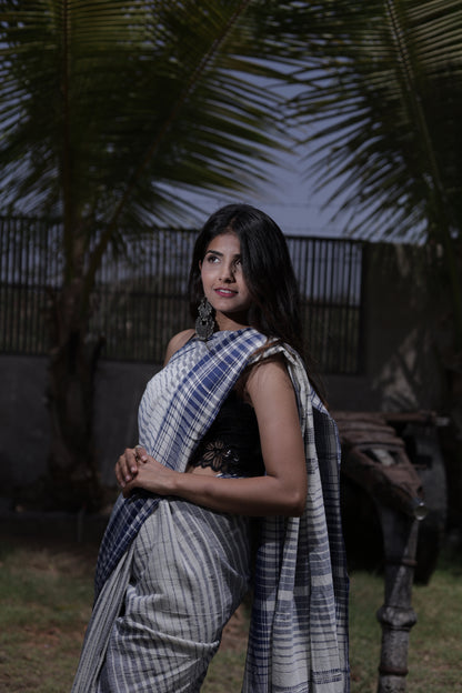 Elegant dusk Bhujodi saree woven in sustainable Kala Cotton with intricate artisan detailing