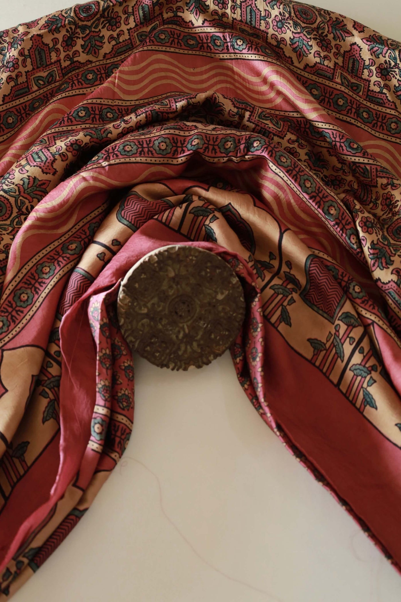 Premium dusty rose flamingo modal silk saree showcasing authentic Ajrakh craftsmanship and timeless motifs