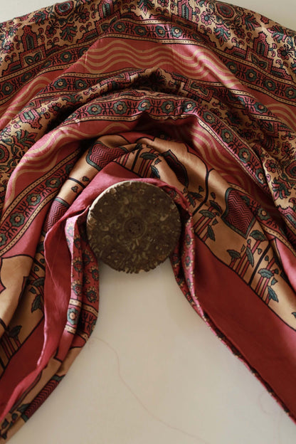 Premium dusty rose flamingo modal silk saree showcasing authentic Ajrakh craftsmanship and timeless motifs