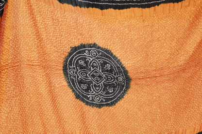 Premium ember Bandhani silk saree highlighting fine artisan craftsmanship and festive elegance