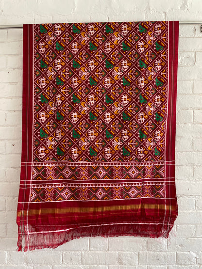 Handcrafted Patola silk dupatta showcasing authentic Double Ikat weaving artistry