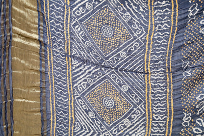 Handcrafted indigo silk saree showcasing authentic Rai Bandhani artistry with rich zari detailing