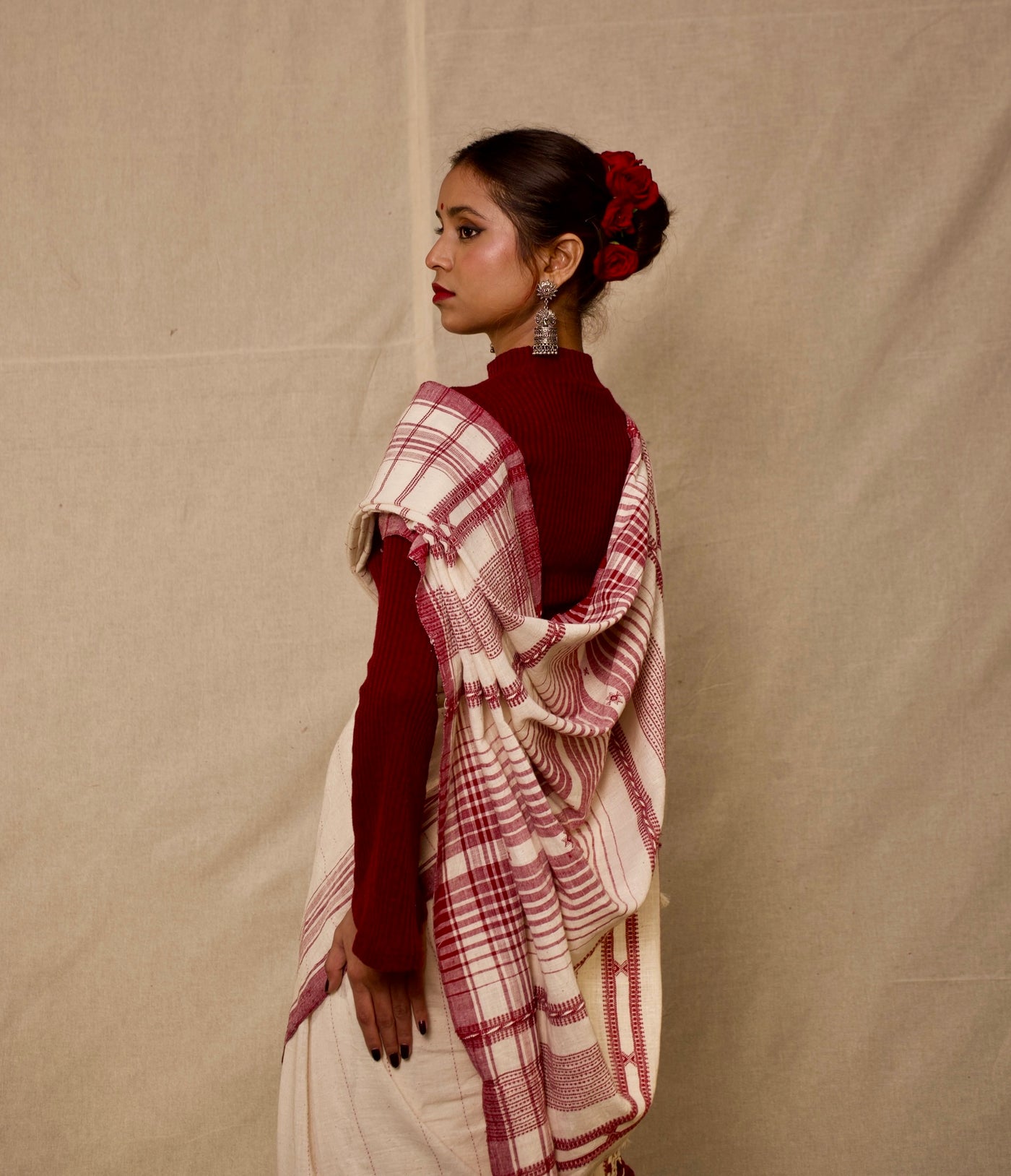 Premium ivory Kala Cotton saree showcasing traditional Bhujodi textile artistry and timeless appeal