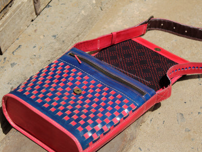 Leather bag adorned with intricate zari work on premium handcrafted leather
