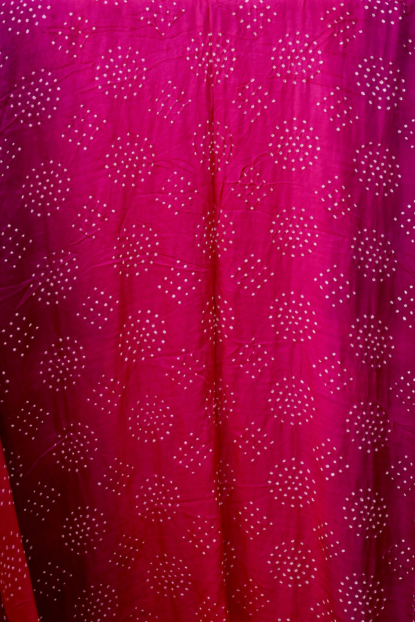 Handcrafted magenta Gajji silk saree showcasing authentic Bandhani artistry with rich zari detailing