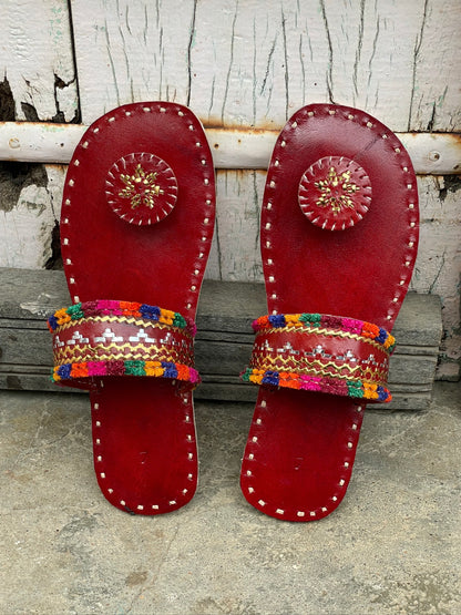 Premium maroon handcrafted leather flats with fine artisan stitching details