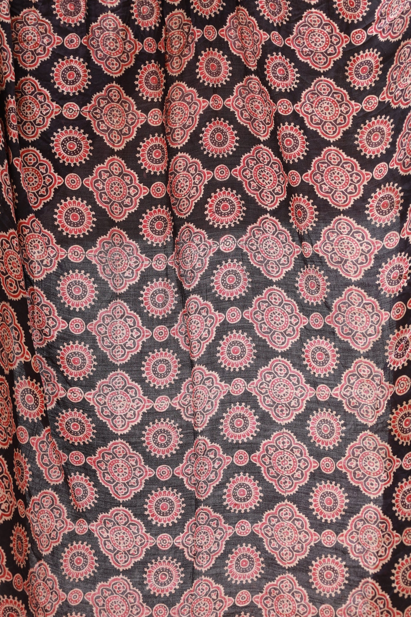 Traditional Ajrakh Bandhani silk saree in maroon hues with rich cultural and artisanal detailing