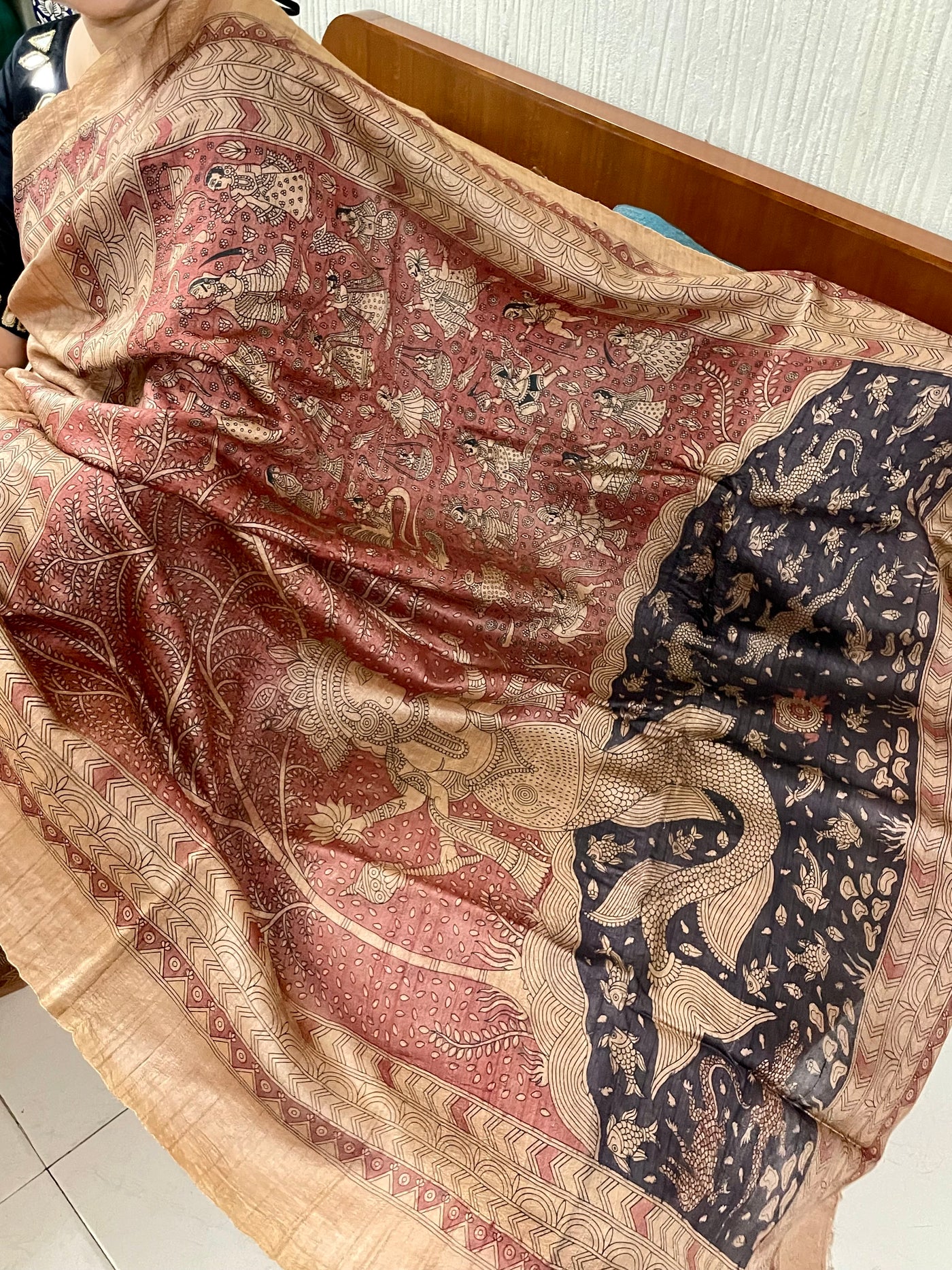 Elegant mauve saree showcasing detailed Mata Ni Pachedi artwork created by skilled artisans