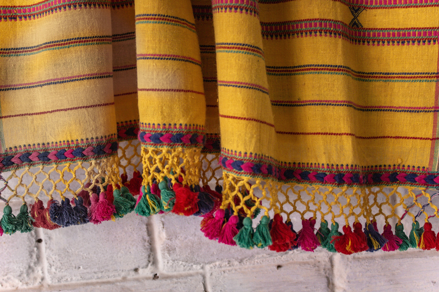 Traditional mustard Bhujodi Kala Cotton saree with rich handwoven textures and graceful drape