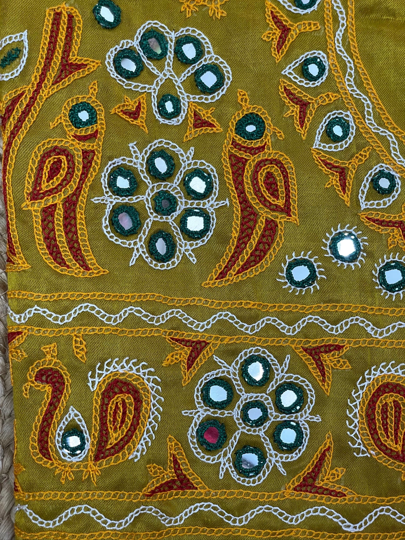 Traditional mustard yellow blouse piece featuring authentic Ahir embroidery craftsmanship