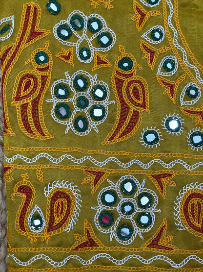 Traditional mustard yellow blouse piece featuring authentic Ahir embroidery craftsmanship