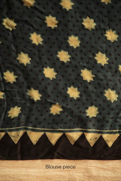 Premium pine green modal silk saree showcasing authentic Ajrakh hand block printing techniques