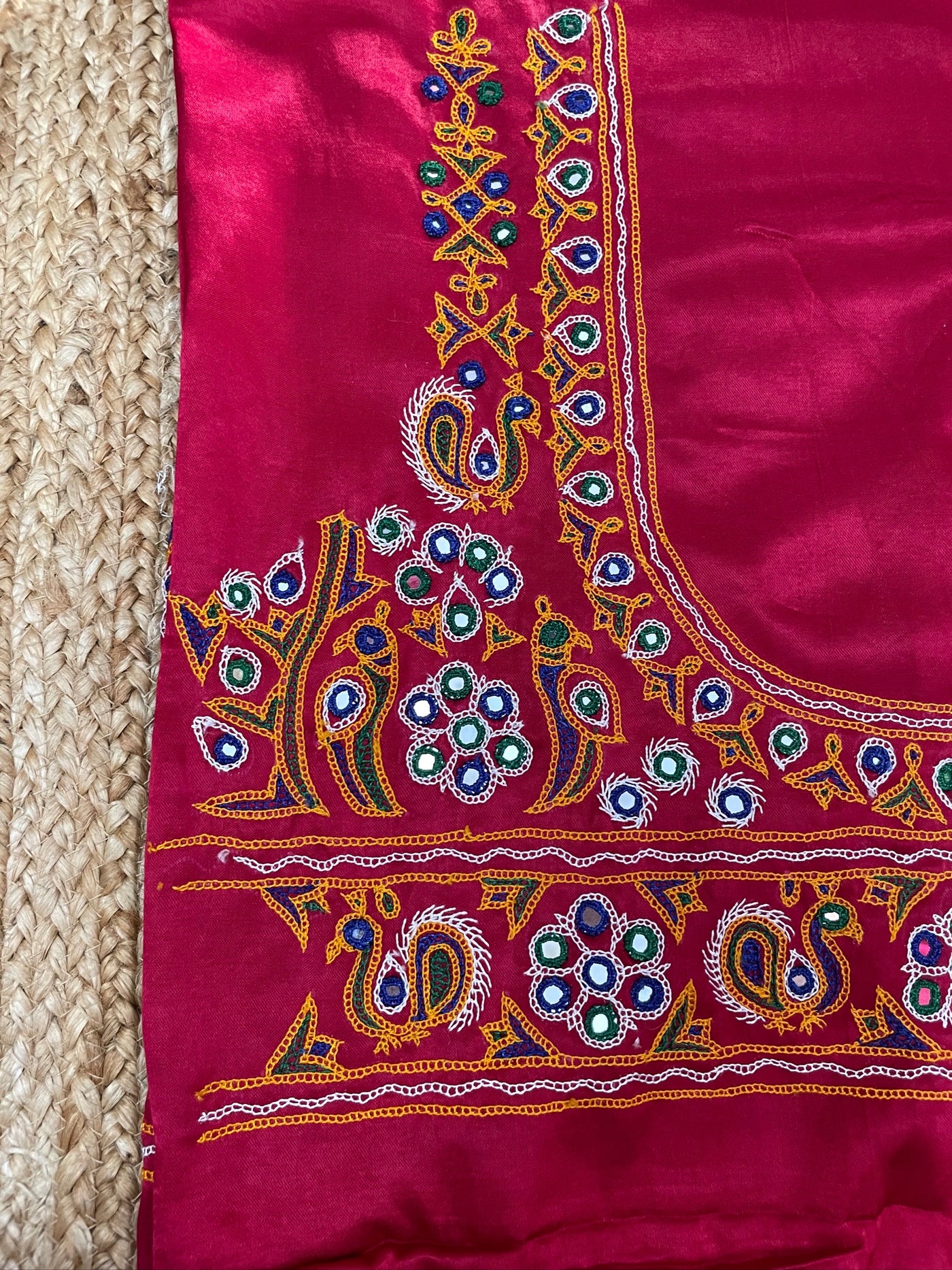Traditional pink blouse piece featuring authentic Ahir embroidery craftsmanship