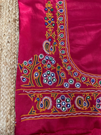 Traditional pink blouse piece featuring authentic Ahir embroidery craftsmanship
