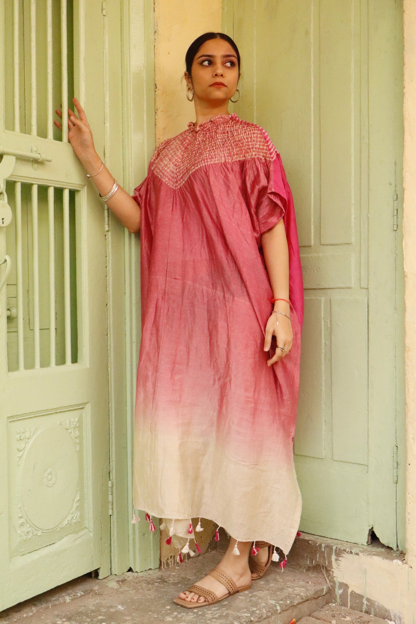 Traditional Bandhani Shibori silk kaftan highlighting rich craftsmanship and contemporary elegance