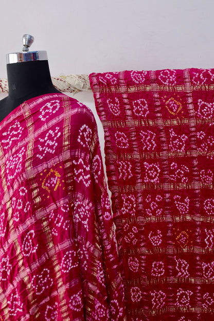 Traditional Bandhani Gharchola saree in rosewood tones crafted from luxurious Gajji silk