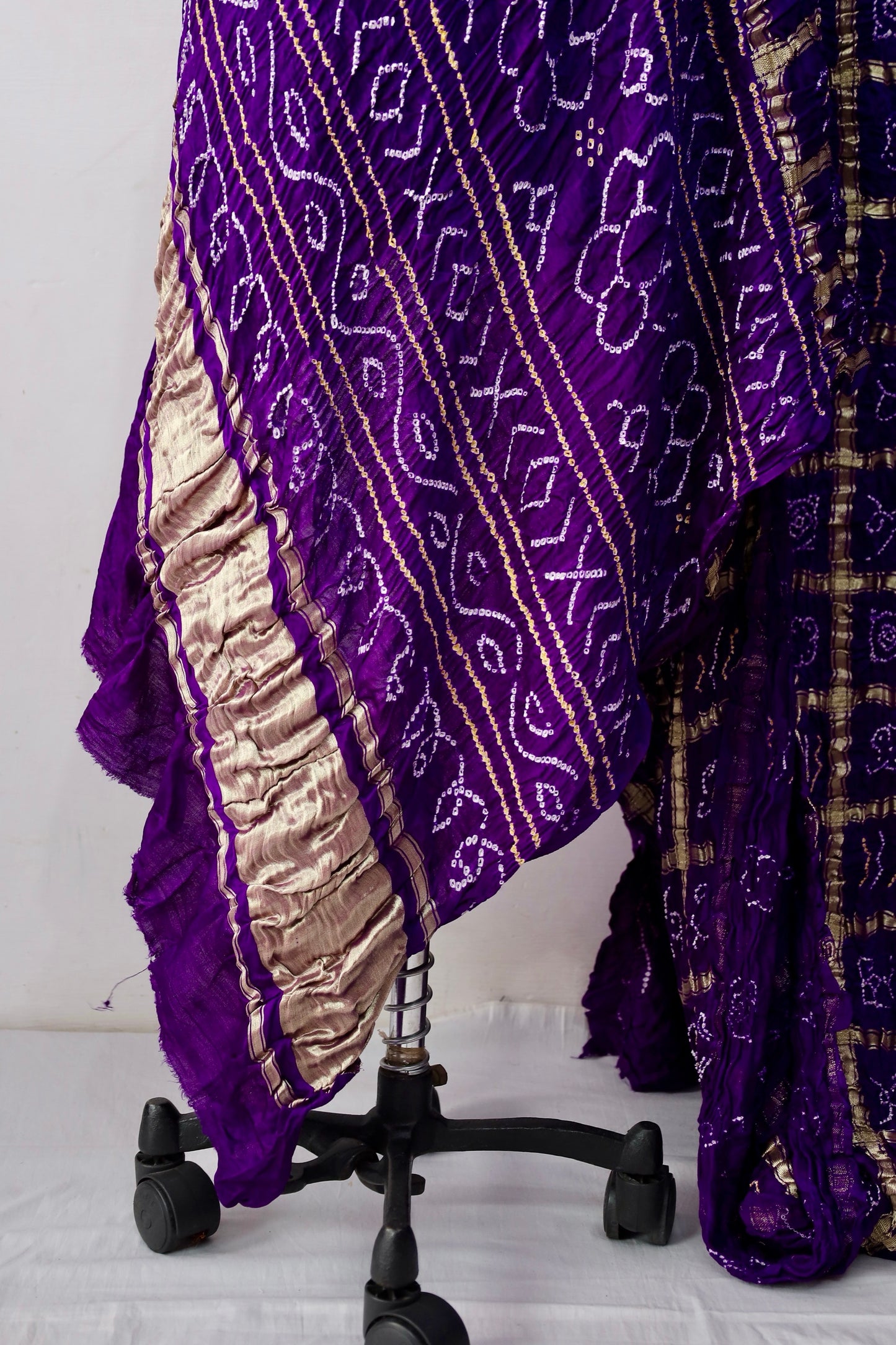 Elegant Gajji silk saree adorned with handcrafted Bandhani patterns and classic Gharchola design