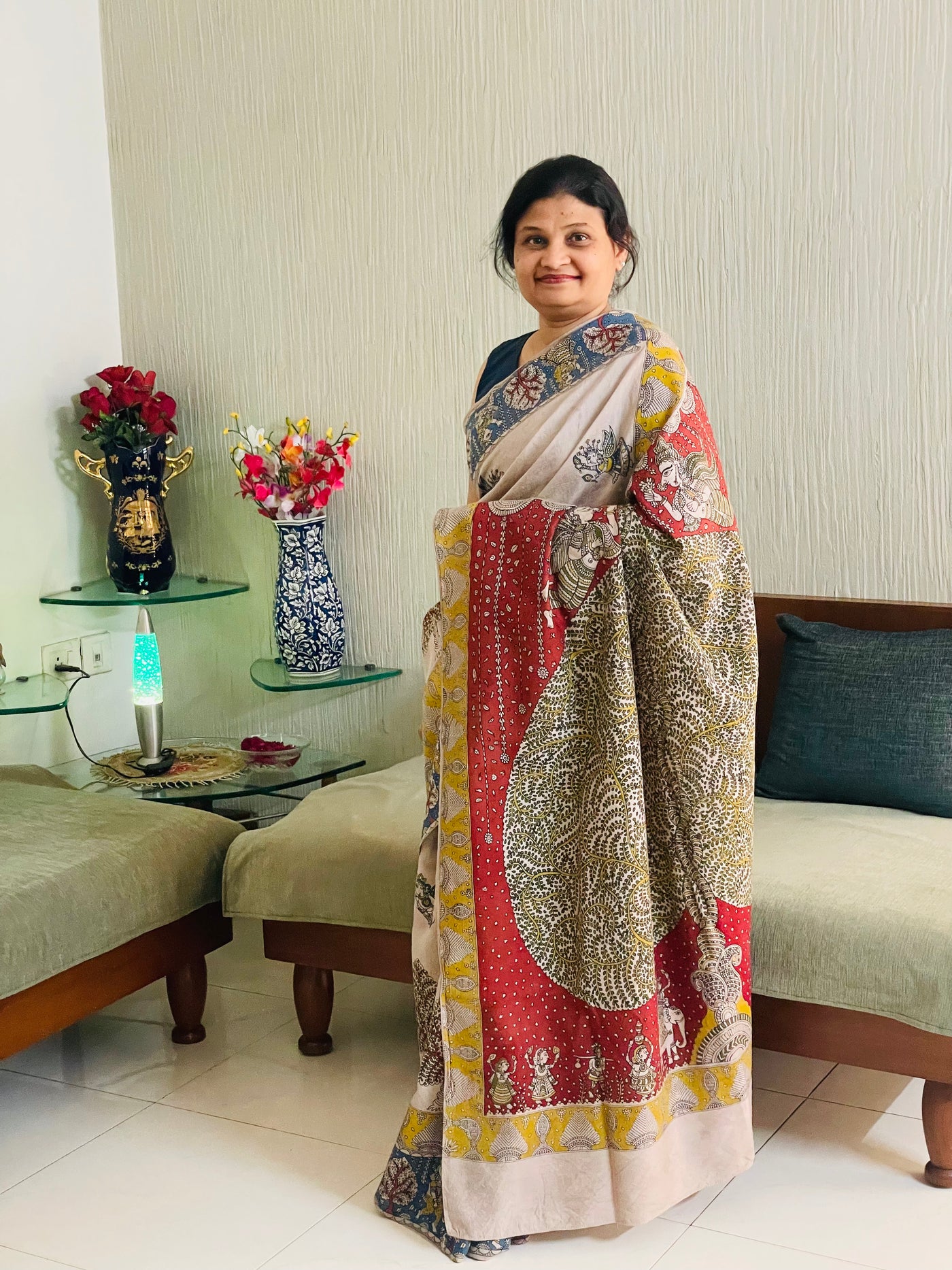 Traditional sandstone Mata Ni Pachedi saree with vibrant handpainted motifs and graceful artisanal craftsmanship