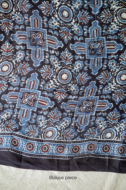 Traditional sapphire blue Ajrakh printed modal silk saree crafted by artisans with exceptional craftsmanship