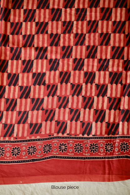 Traditional scarlet and black Ajrakh printed modal silk saree crafted by artisans with exceptional craftsmanship