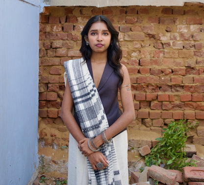 Premium snowy Kala Cotton saree showcasing traditional Bhujodi textile artistry and timeless appeal