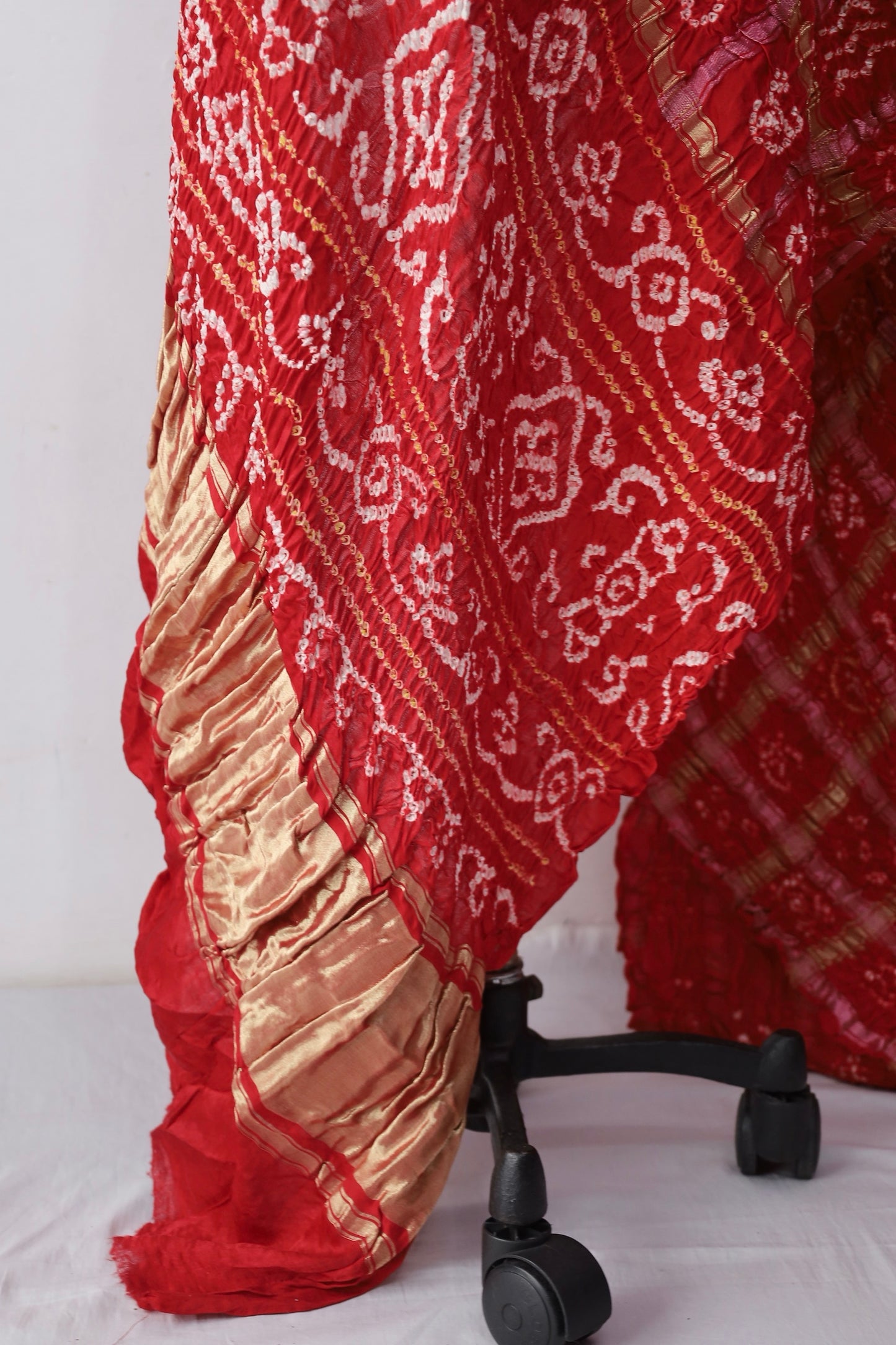 Traditional Gharchola saree with handcrafted Bandhani motifs and rich cultural detailing