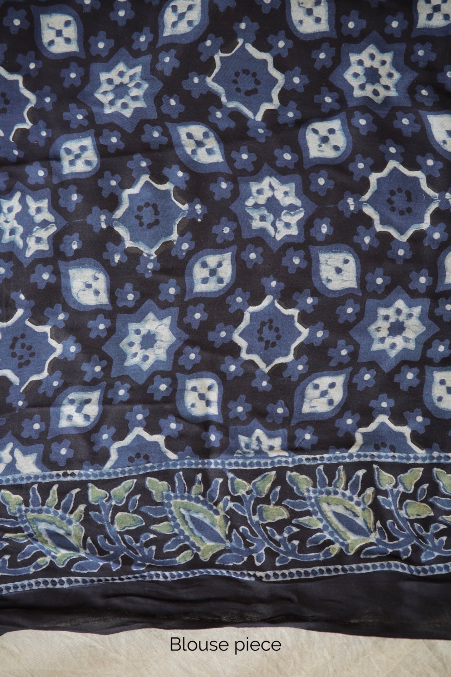 Traditional steel blue Ajrakh printed modal silk saree crafted by artisans with refined craftsmanship