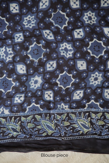 Traditional steel blue Ajrakh printed modal silk saree crafted by artisans with refined craftsmanship