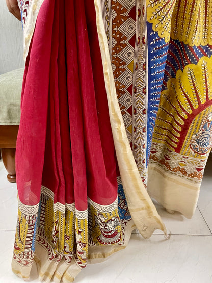 Premium sunburst handpainted saree reflecting the cultural richness and storytelling tradition of Mata Ni Pachedi art