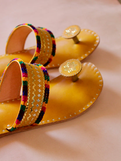 Premium yellow handcrafted leather flats with fine artisan stitching details