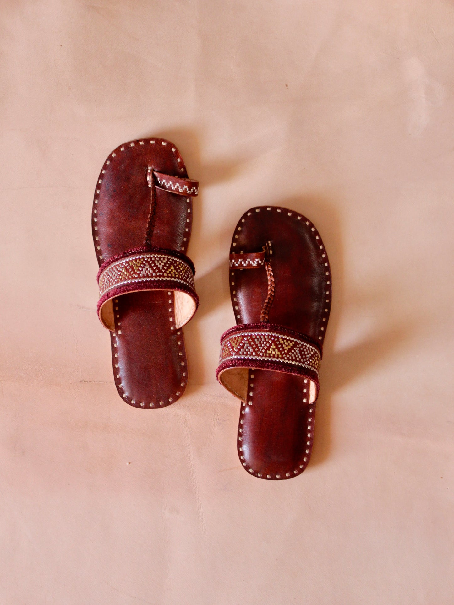 ari handstitched leather flats showcasing traditional craftsmanship and intricate detailing